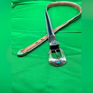 Gorgeous, metallic silver and black with blue belt turquoise like Belt buckle.